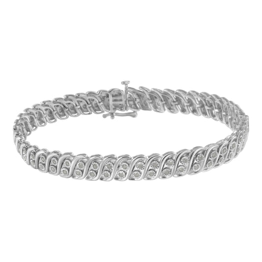 White bracelet with rows of round white gemstones in a miracle setting, shown from a front angle.