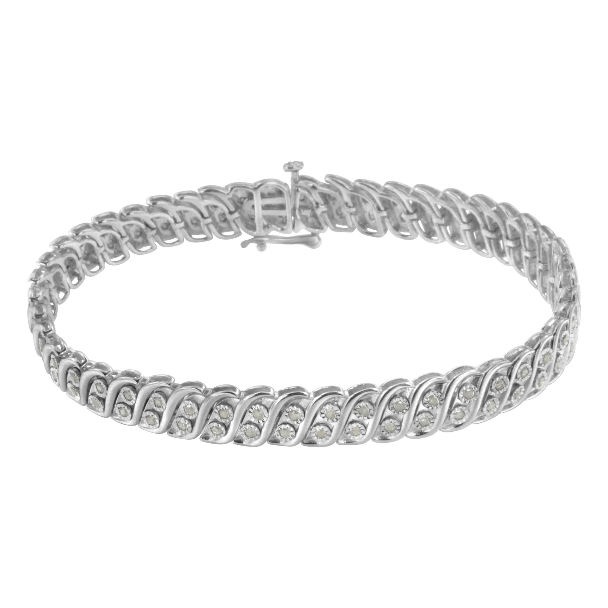 White metal bracelet with a repeating twisted design set with round white gemstones, shown from a front angle against a white background.