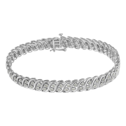 White metal bracelet with a repeating twisted design set with round white gemstones, shown from a front angle against a white background.
