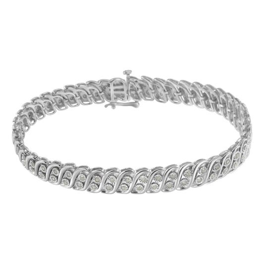 White metal bracelet with a repeating twisted design set with round white gemstones, shown from a front angle against a white background.