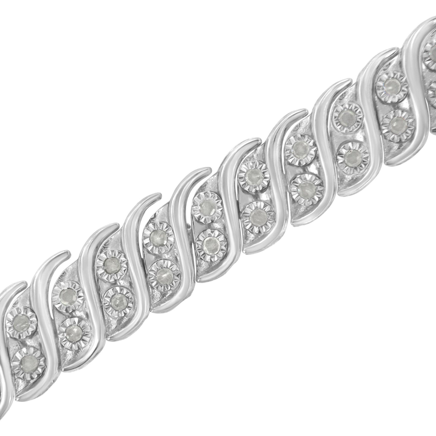 Diagonal close-up of a white metal bracelet with a repeating wave pattern, each section set with round white gemstones in a miracle setting.
