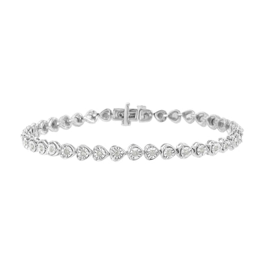 Front angle view of a white metal bracelet featuring a row of heart-shaped links, each set with a round white gemstone in a miracle setting.