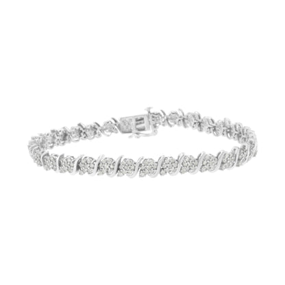 White metal bracelet with round white gemstones in prong settings, shown from a front angled view.