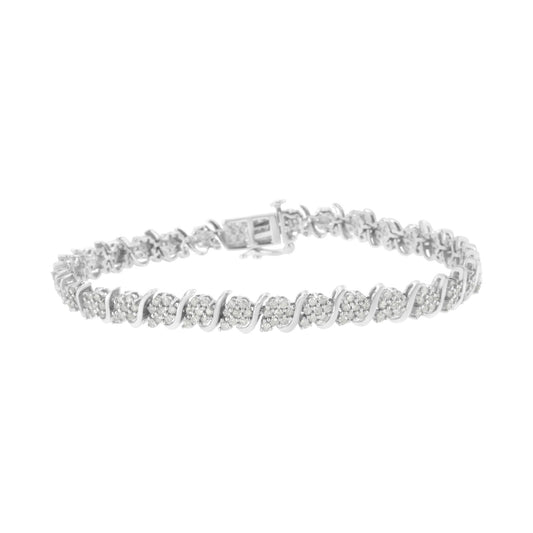 White metal bracelet with round white gemstones in prong settings, shown from a front angled view.