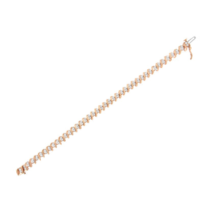 Rose-colored bracelet with round white gemstones in prong settings, shown flat at a slight diagonal angle.