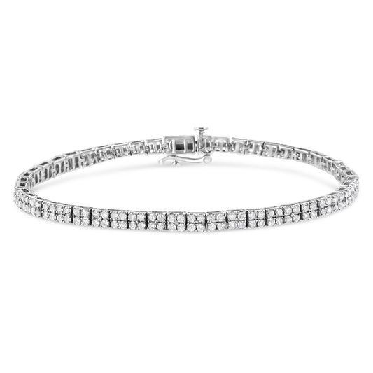 White metal bracelet with multiple rows of round white gemstones in prong settings, shown from a front angle.