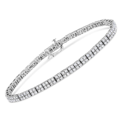 White metal bracelet with multiple rows of round white gemstones in prong settings, shown at an angled top view.