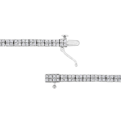 Close-up top-down view of a white bracelet with evenly spaced square sections, each set with multiple round white gemstones in a prong setting, shown unclasped on a white background.