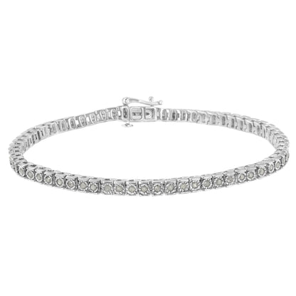 White metal bracelet with round white gemstones in a channel setting, shown from a front angled view.