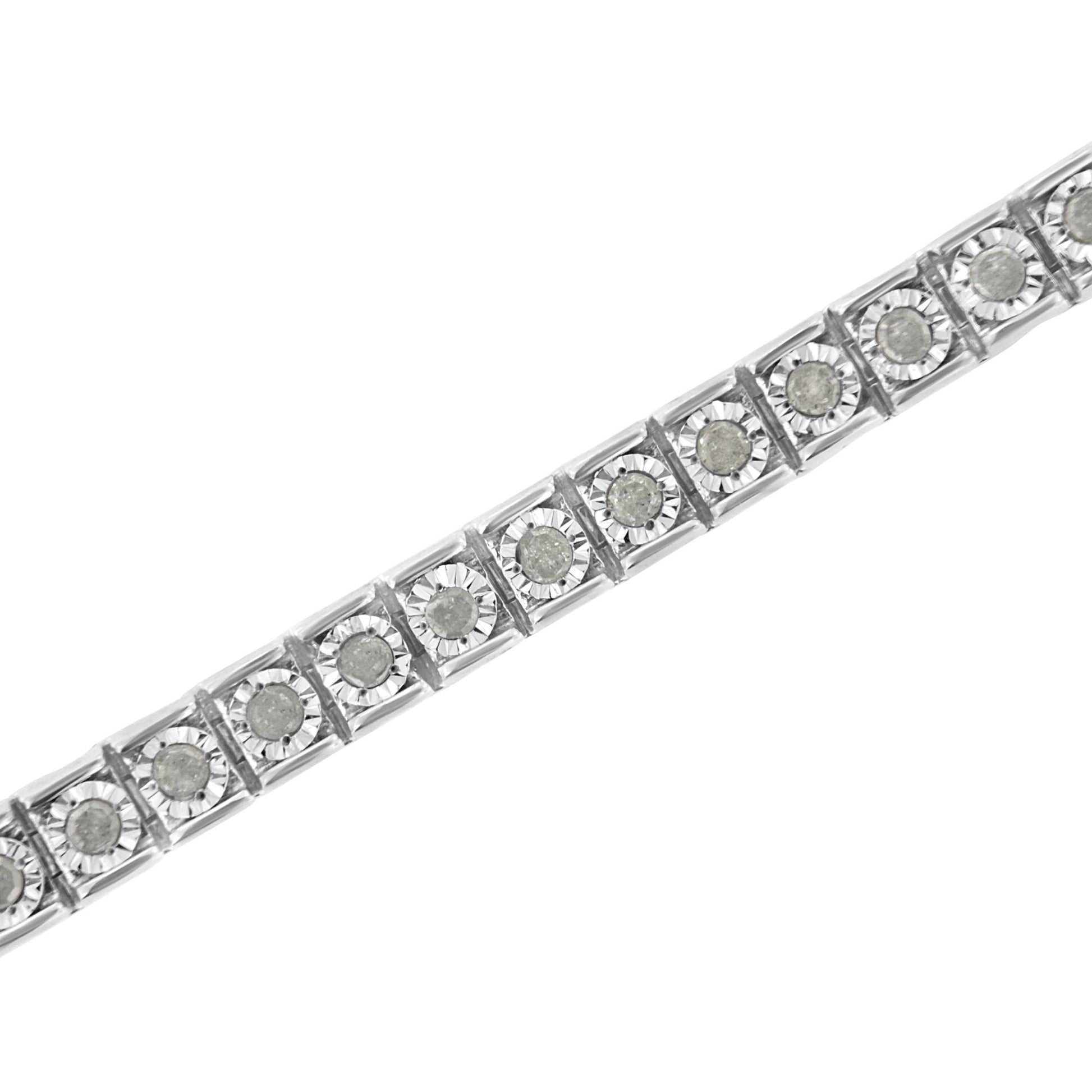 Close-up angled view of a white metal bracelet featuring round white gemstones in a channel setting.