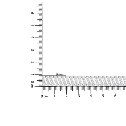 Bracelet with white metal and round white gemstones in prong settings, shot from above, placed on a ruler for size reference.