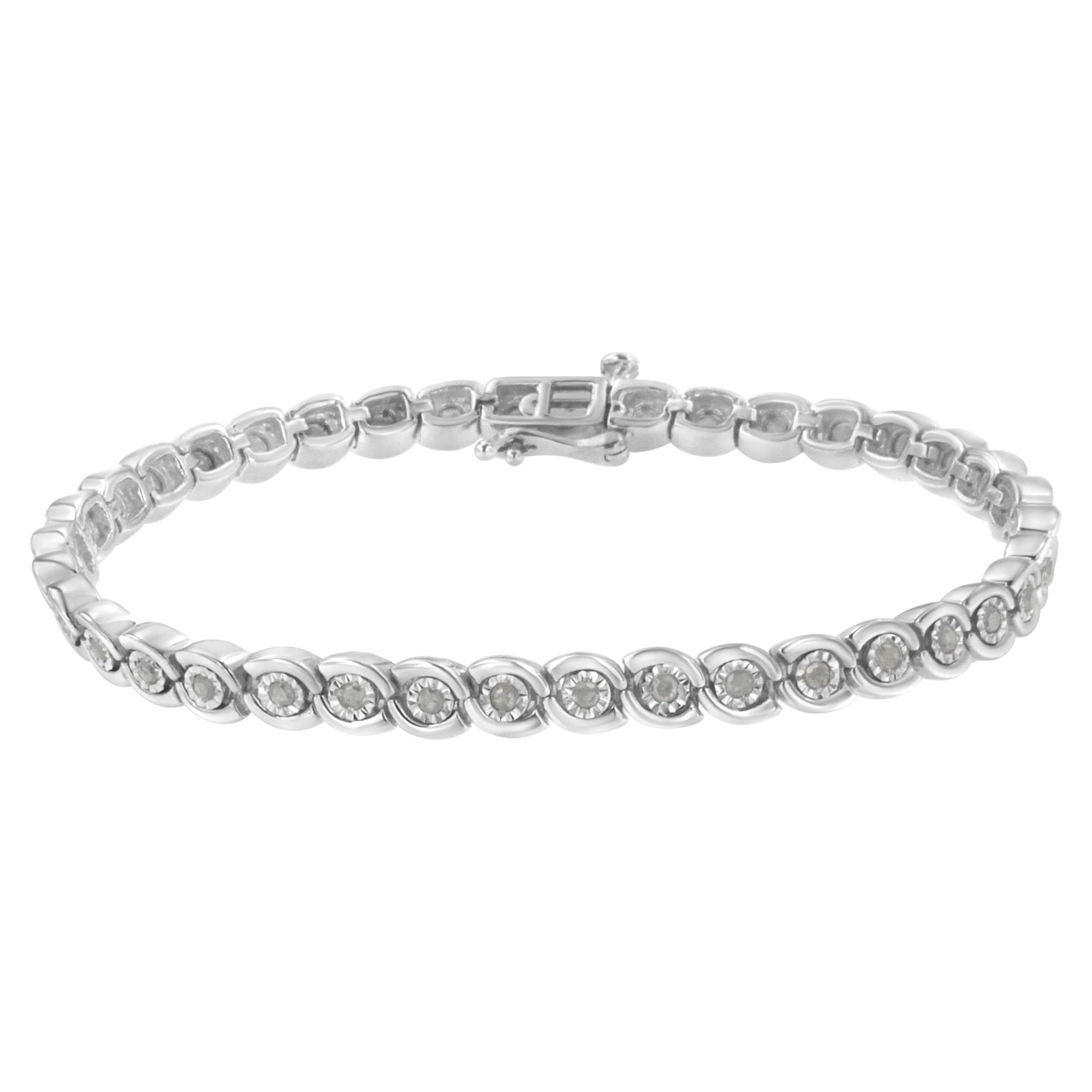 White metal bracelet with round white gemstones in miracle settings, shown in a front-facing, slightly elevated angle.
