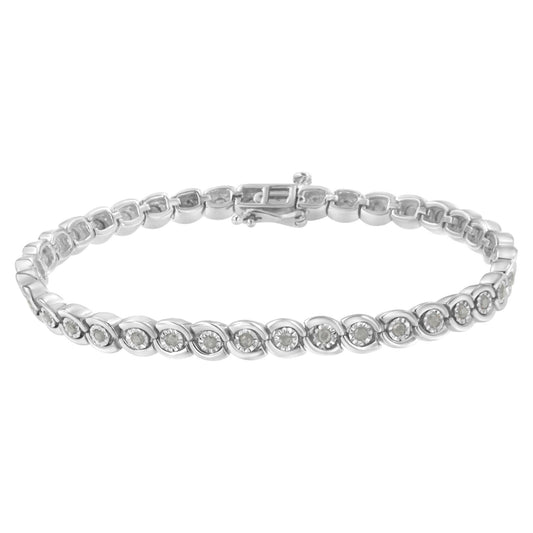 White metal bracelet with round white gemstones in miracle settings, shown in a front-facing, slightly elevated angle.