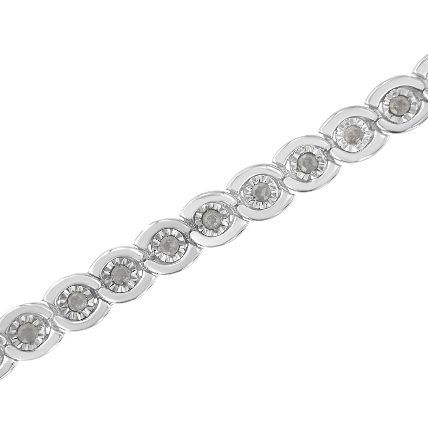 Close-up diagonal shot of a white metal bracelet featuring round white gemstones set in a miracle setting.