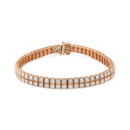 Rose metal bracelet with two rows of white round gemstones in prong settings, shown from a front angled view.