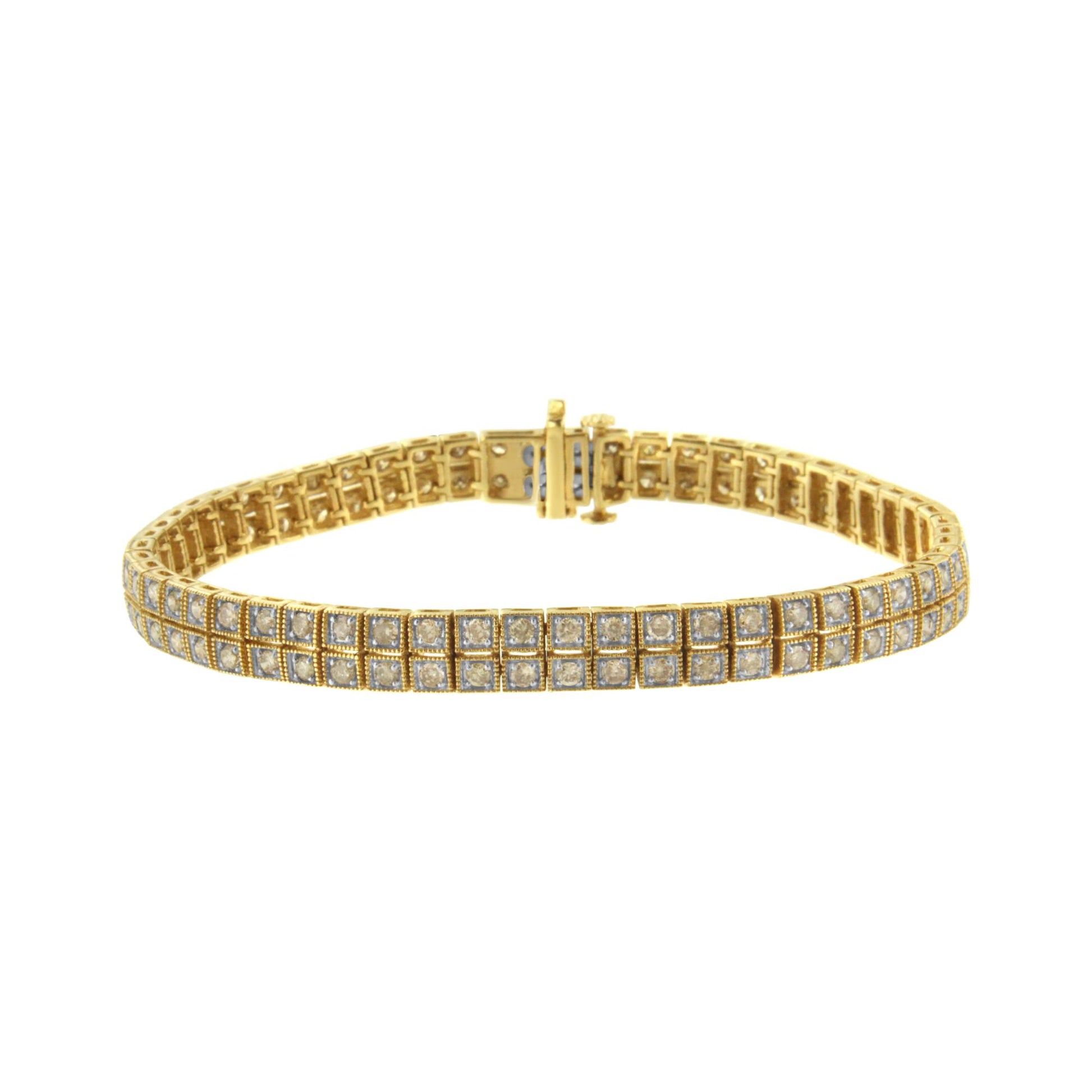 Close-up front angle of a yellow metal bracelet featuring multiple round prong-set brownish gemstones arranged in a grid pattern.