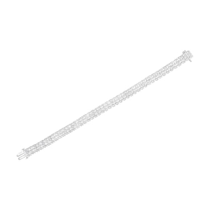 White bracelet with multiple round white gemstones in prong settings, shown flat on a white background from a top-down angle.