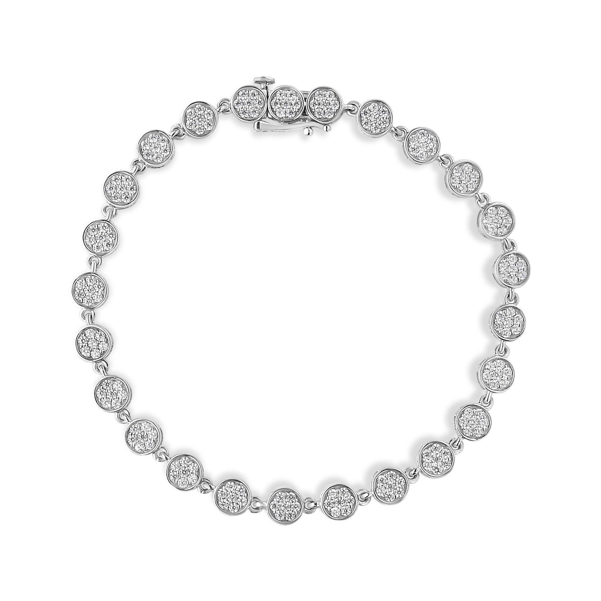 Top-down view of a white metal bracelet with circular links, each set with multiple small white round gemstones in prong settings.