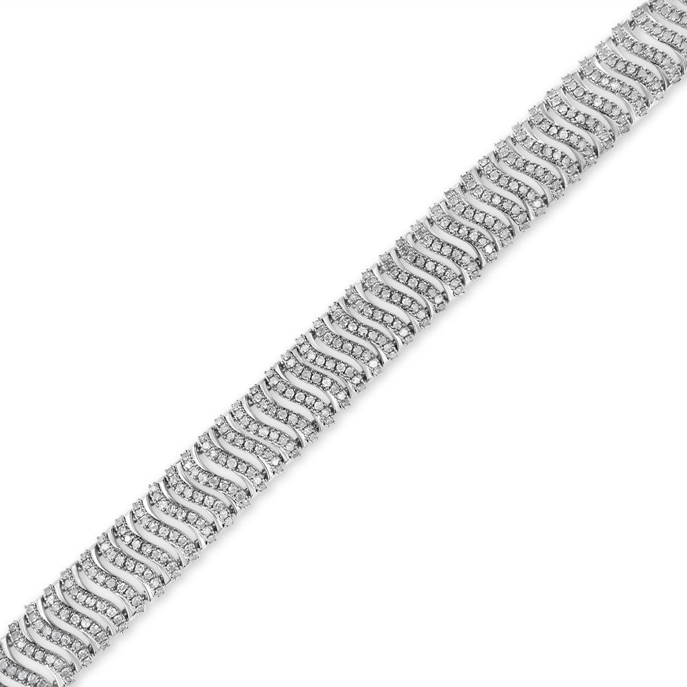 Diagonal close-up of a white bracelet featuring a wavy pattern set with multiple round white gemstones in prong settings.