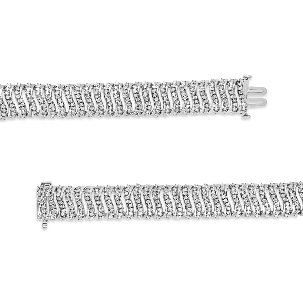 Close-up top down view of a white metal bracelet with rows of round white gemstones in prong settings, shown separately with both ends visible.