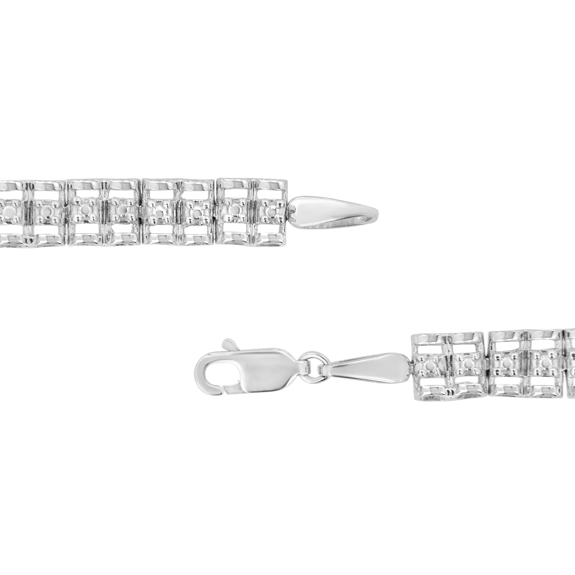 Close-up, top-down view of a white bracelet with square links and round white gemstones in prong settings, shown unclasped on a white background.