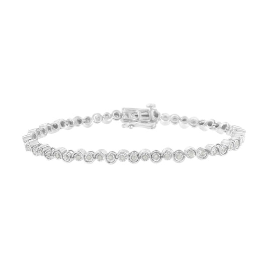 White metal bracelet with round white gemstones in a miracle setting, front angle view.