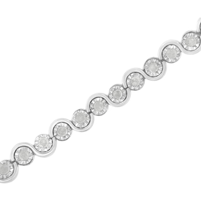 Close-up diagonal view of a white metal bracelet with round white gemstones set in alternating circular and wave-shaped links.