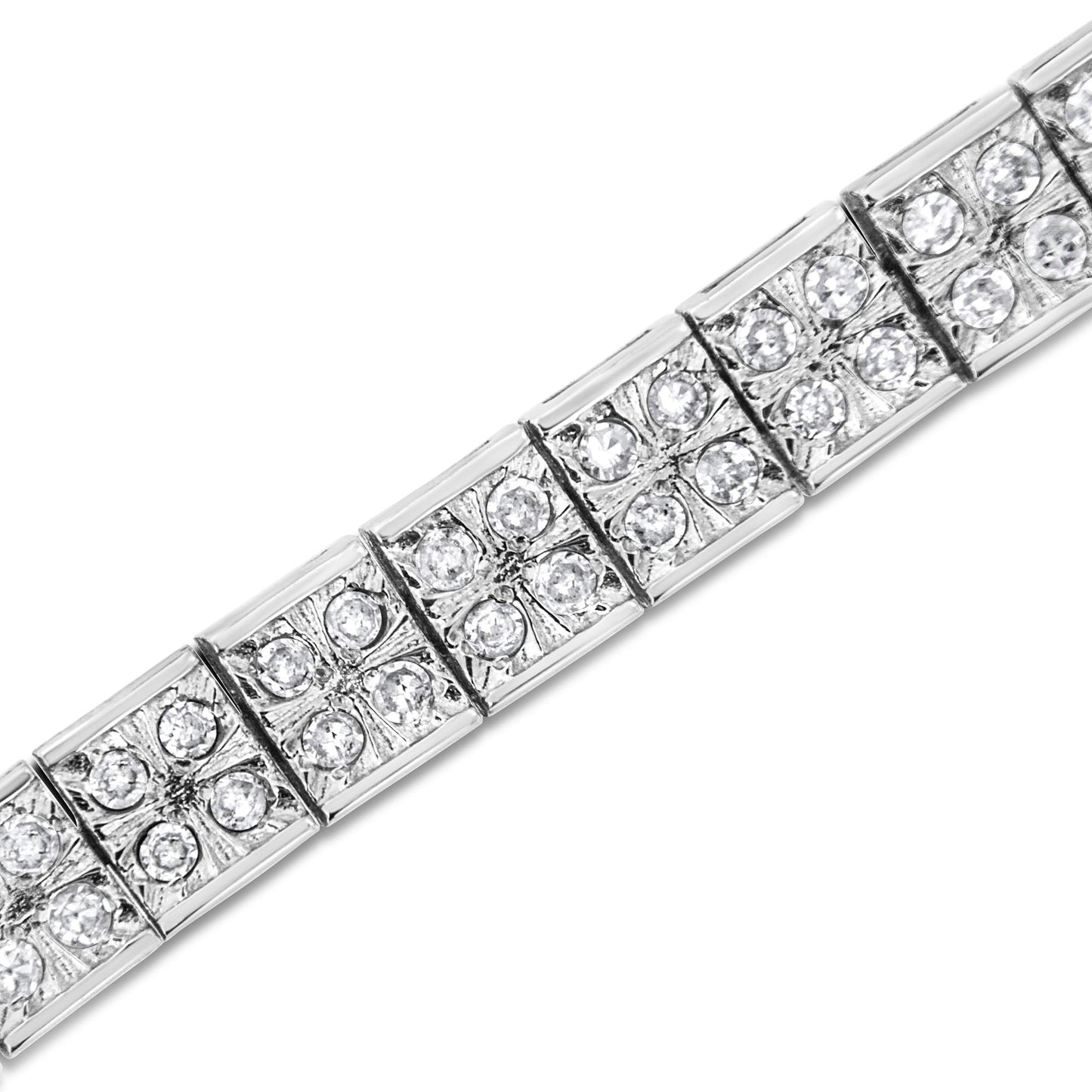 Close-up angled view of a white metal bracelet with square links, each set with multiple round white gemstones in prong settings.