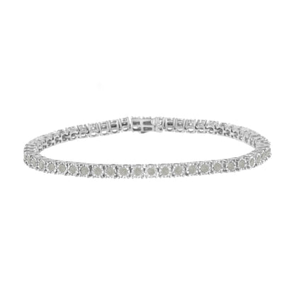 Front-facing view of a white metal bracelet featuring a line of round white gemstones in a miracle setting.