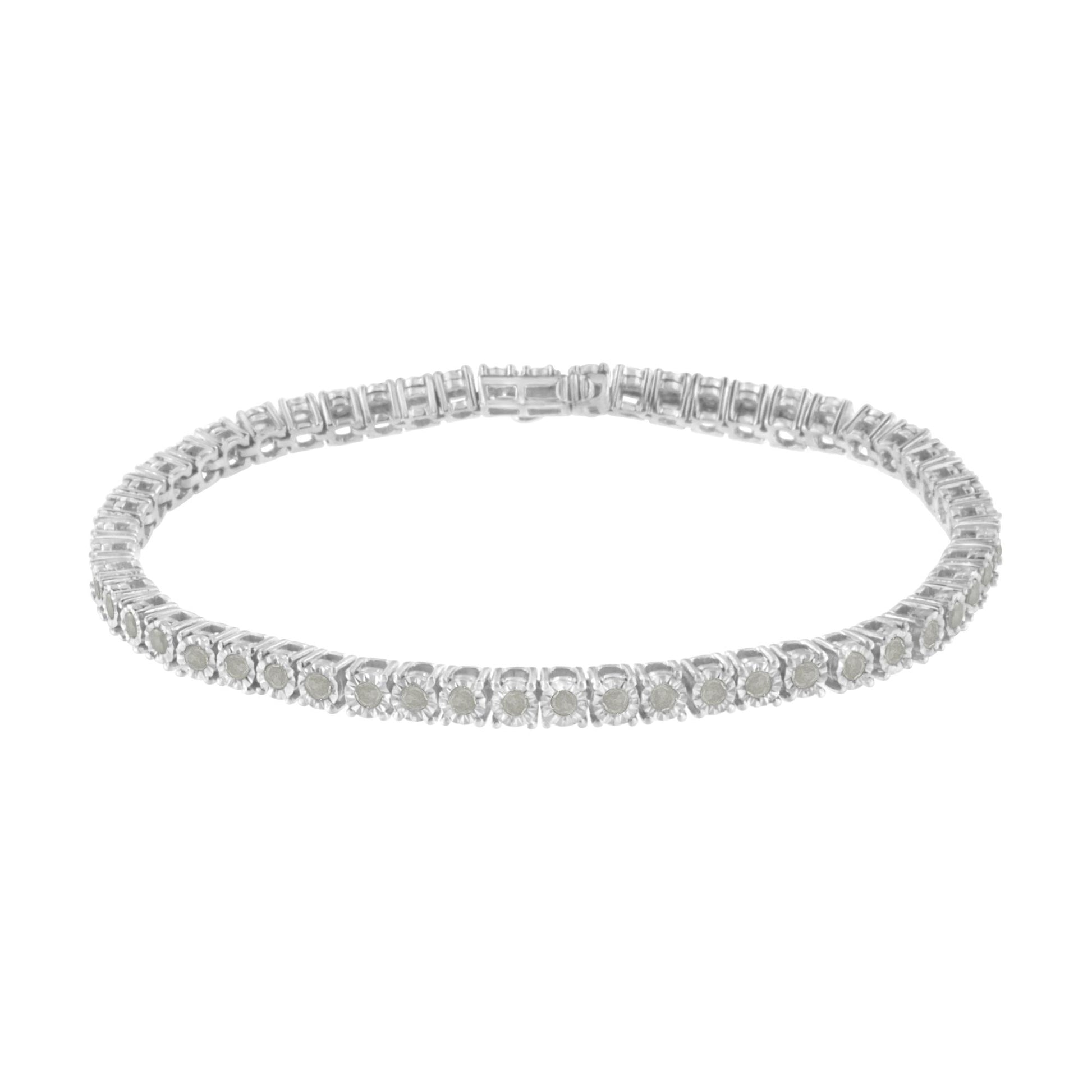 White metal bracelet with round white gemstones in miracle setting, shown from a front angle on a white background.