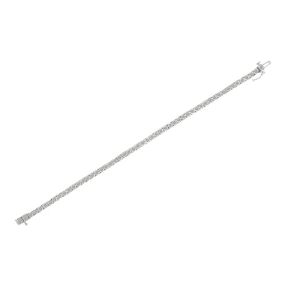 White metal bracelet with round white gemstones in a miracle setting, shown in a flat lay angled top-down view.