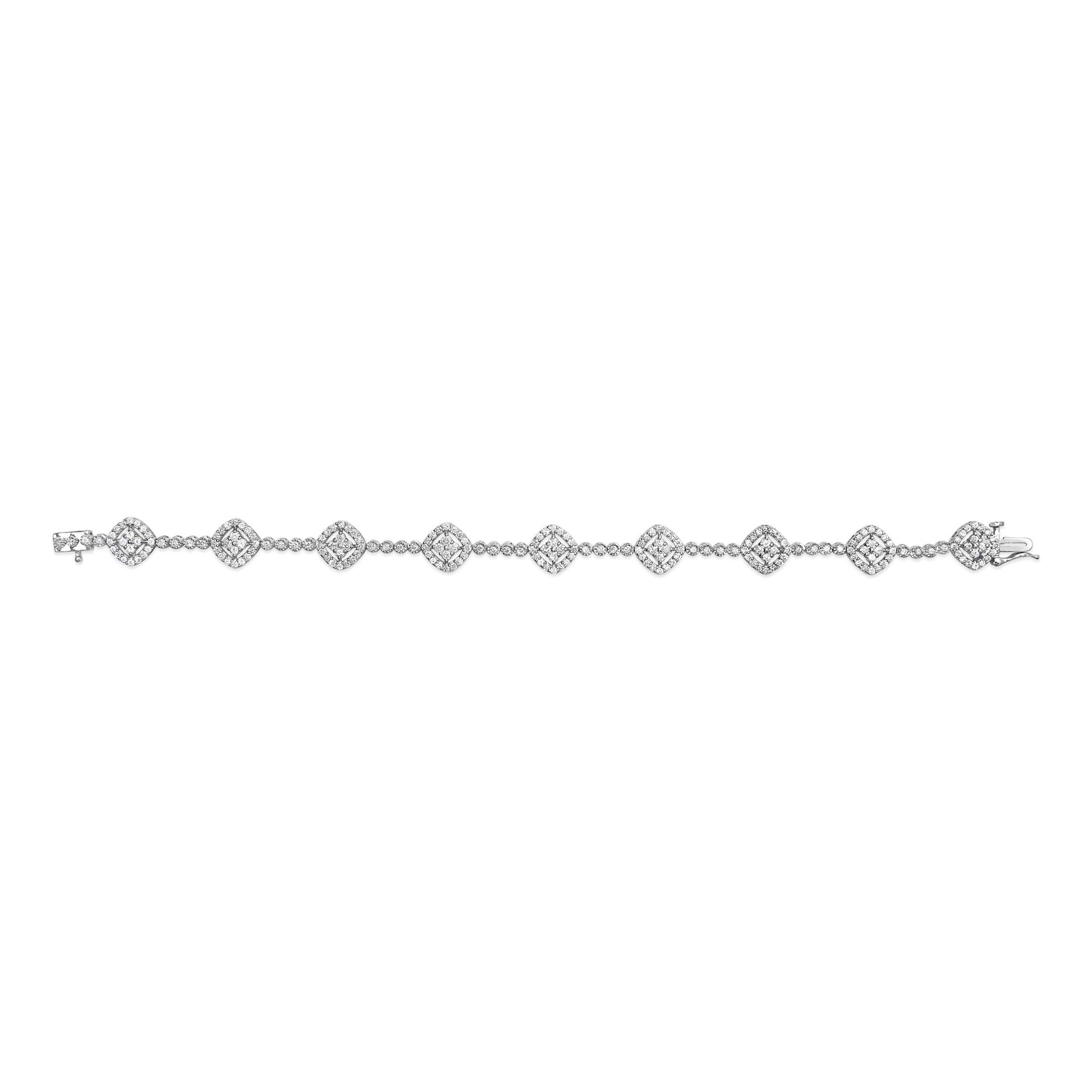 White metal bracelet with alternating square clusters of white gemstones in miracle settings and round white gemstones in prong settings, shown from a top flat angle.