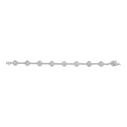 White metal bracelet with alternating square clusters of white gemstones in miracle settings and round white gemstones in prong settings, shown from a top flat angle.