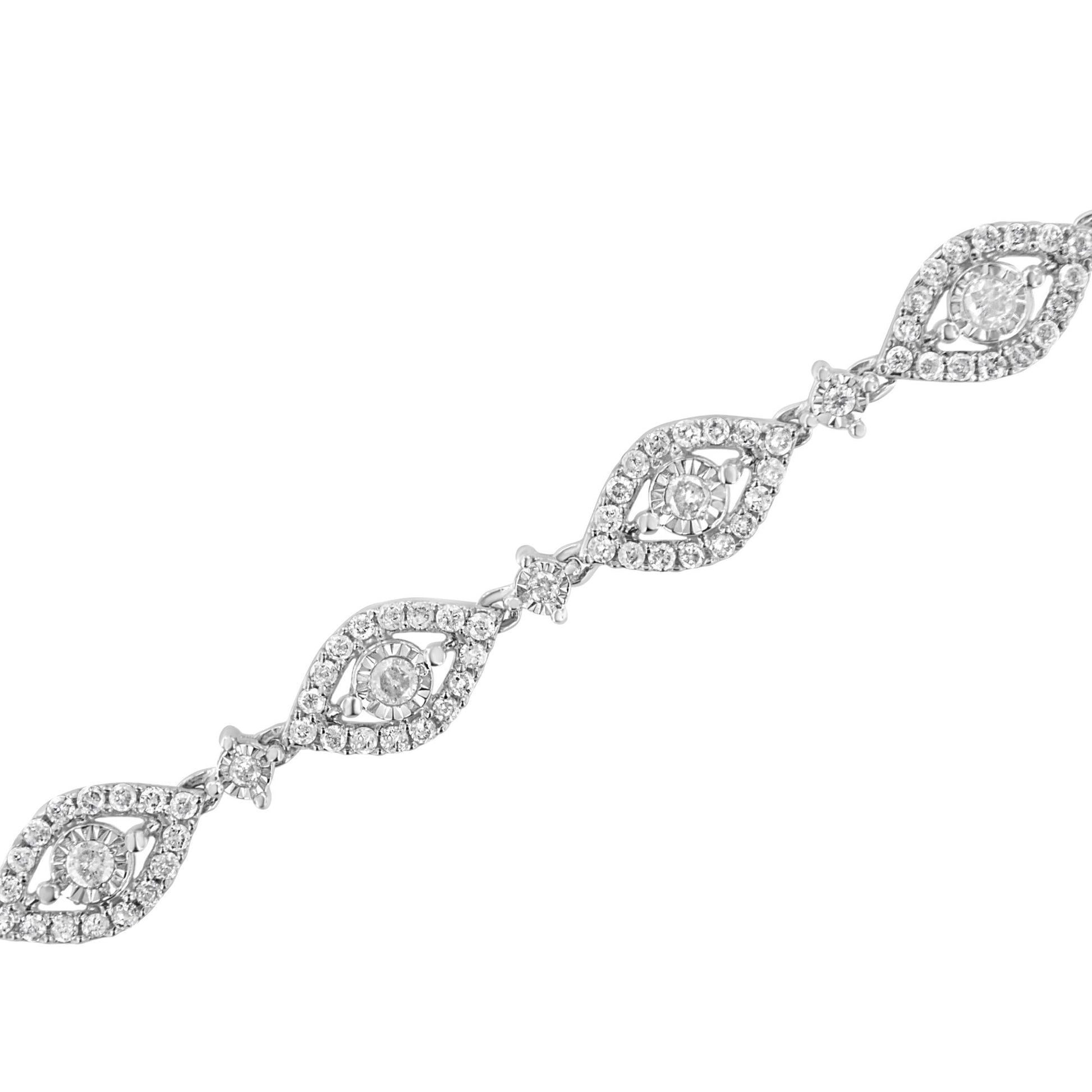 Diagonal close-up of a white metal bracelet with alternating marquise-shaped and round sections, each set with multiple white gemstones in prong and miracle settings.
