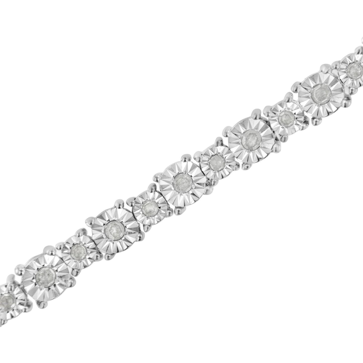 Close-up angled view of a white metal bracelet featuring round white gemstones set in a miracle setting.