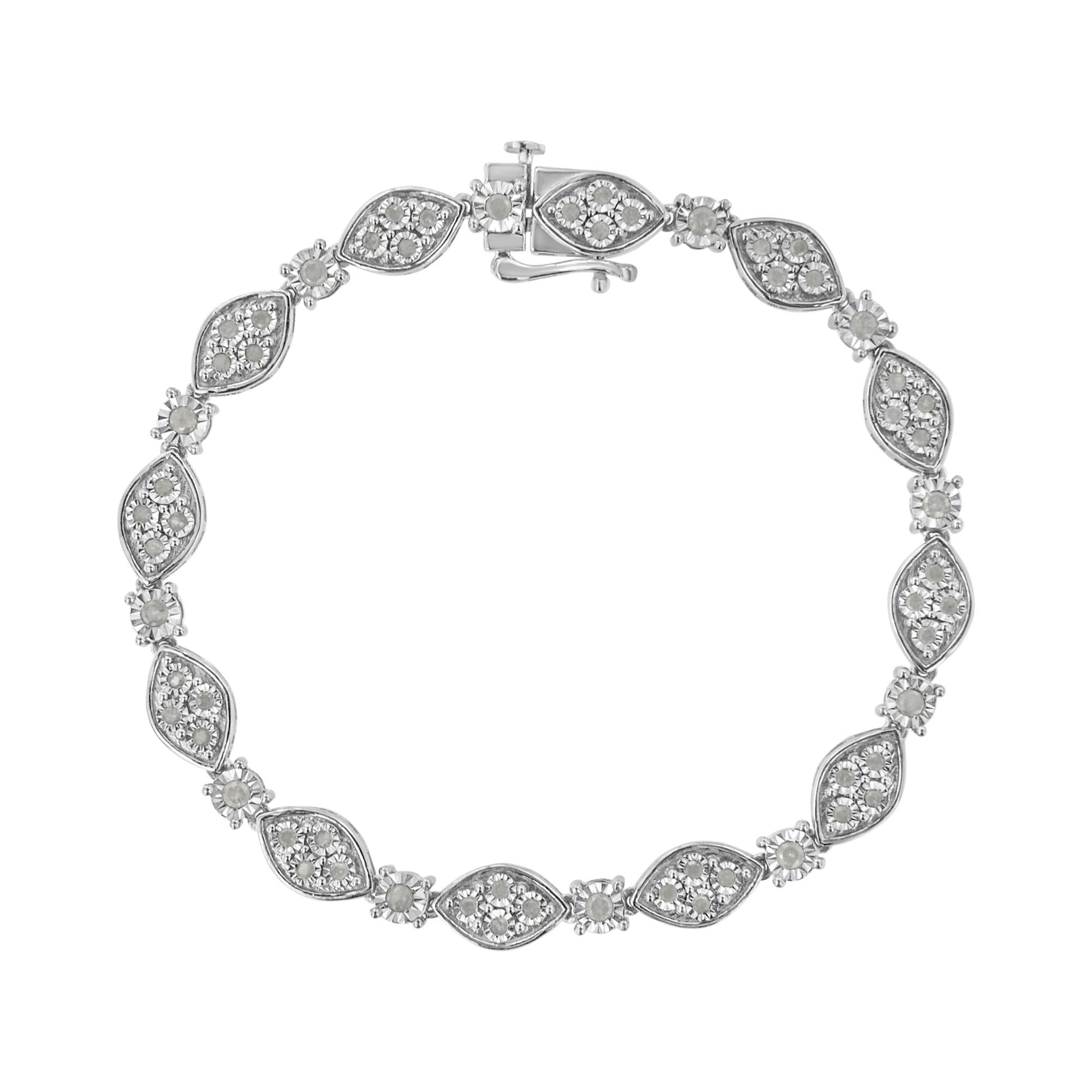 Top-down view of a white metal bracelet with alternating marquise-shaped and round settings, each containing multiple white gemstones in a miracle setting.