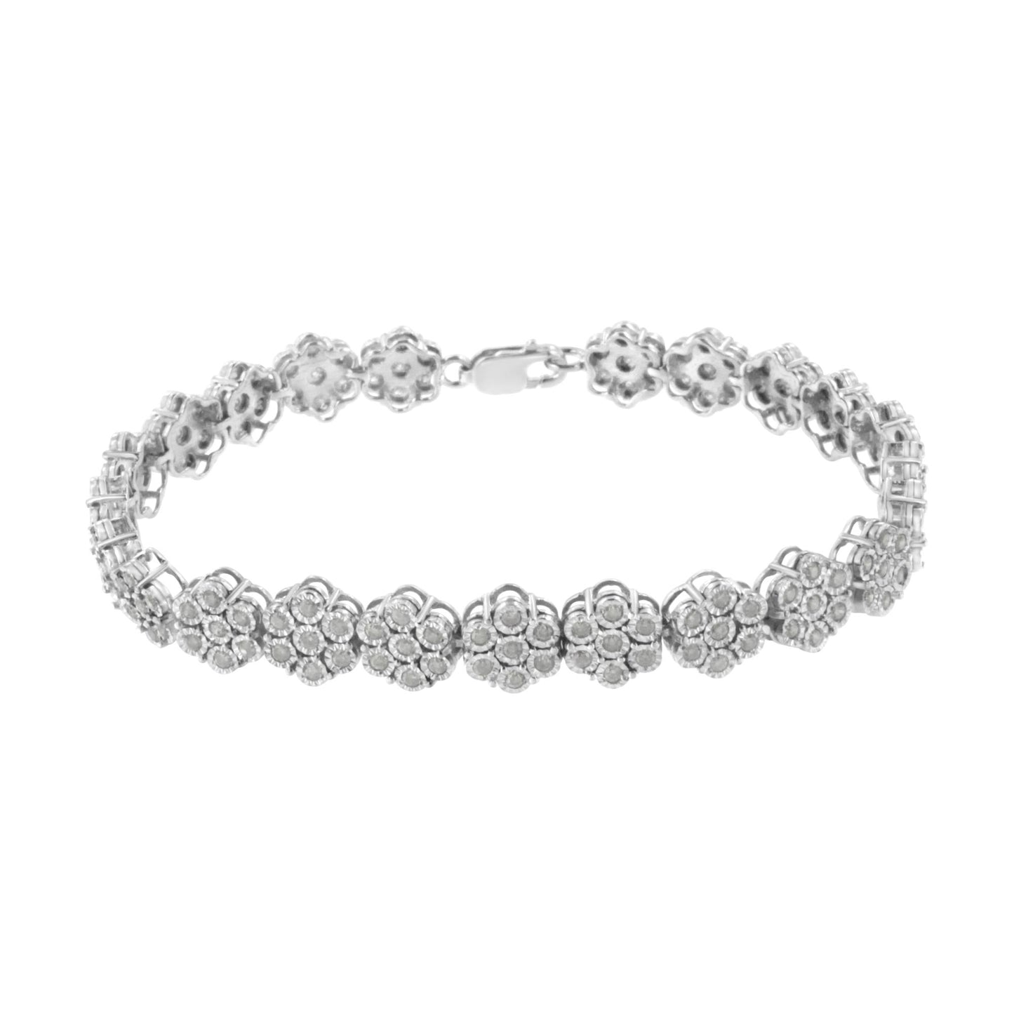 White metal bracelet with floral-shaped clusters of round white gemstones in miracle setting, shown from a front angle.