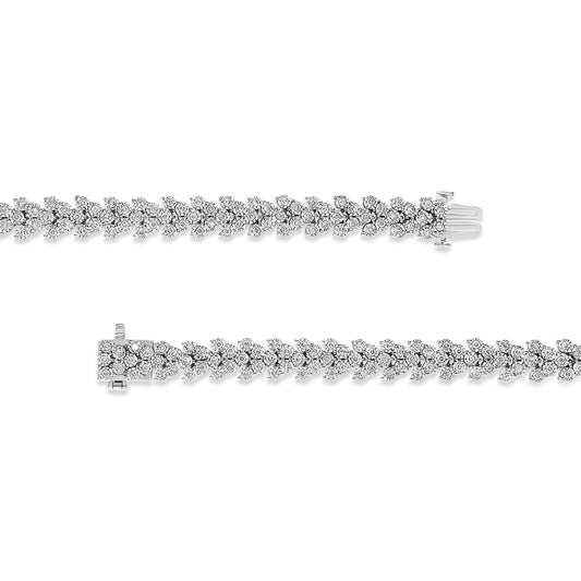 Top-down view of two white metal bracelets featuring a leaf-like pattern with round white gemstones in a miracle setting, shown side by side with clasps visible.