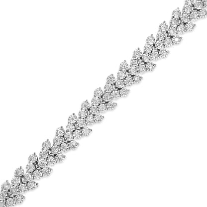 Close-up diagonal view of a white metal bracelet with round white gemstones in a miracle setting.