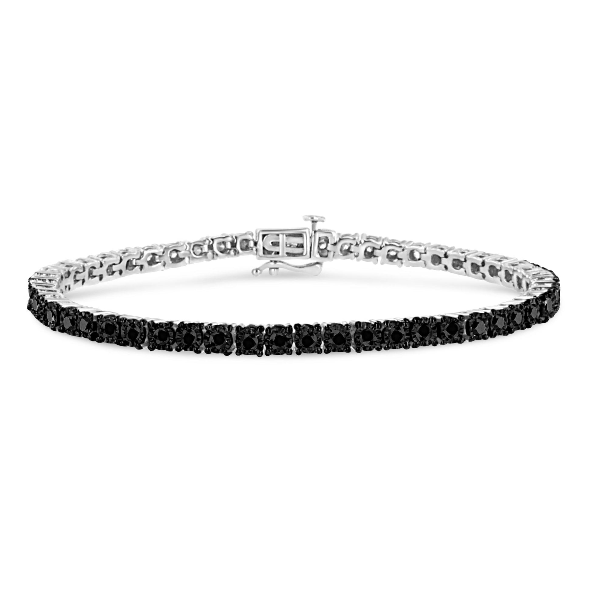 White metal bracelet with round black gemstones in miracle setting, shown in a front-facing shot on a white background.