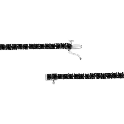 Top-down view of a white metal bracelet with round black gemstones in a miracle setting, showing the clasp open.