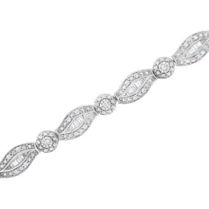 Diagonal close-up of a white metal bracelet with alternating round prong-set and baguette channel-set white gemstones.