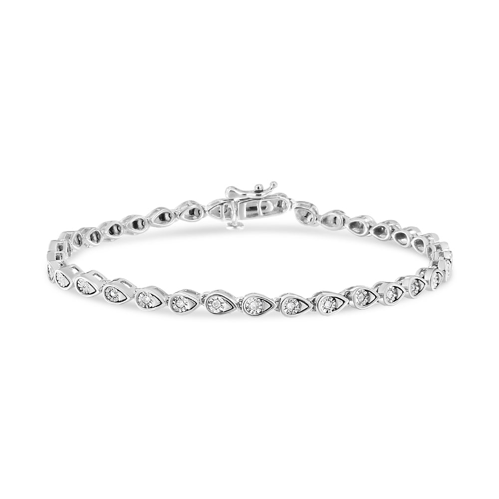 White metal bracelet with round white gemstones in a miracle setting, shot from front angle on a white background.