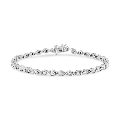 White metal bracelet with round white gemstones in a miracle setting, shot from front angle on a white background.