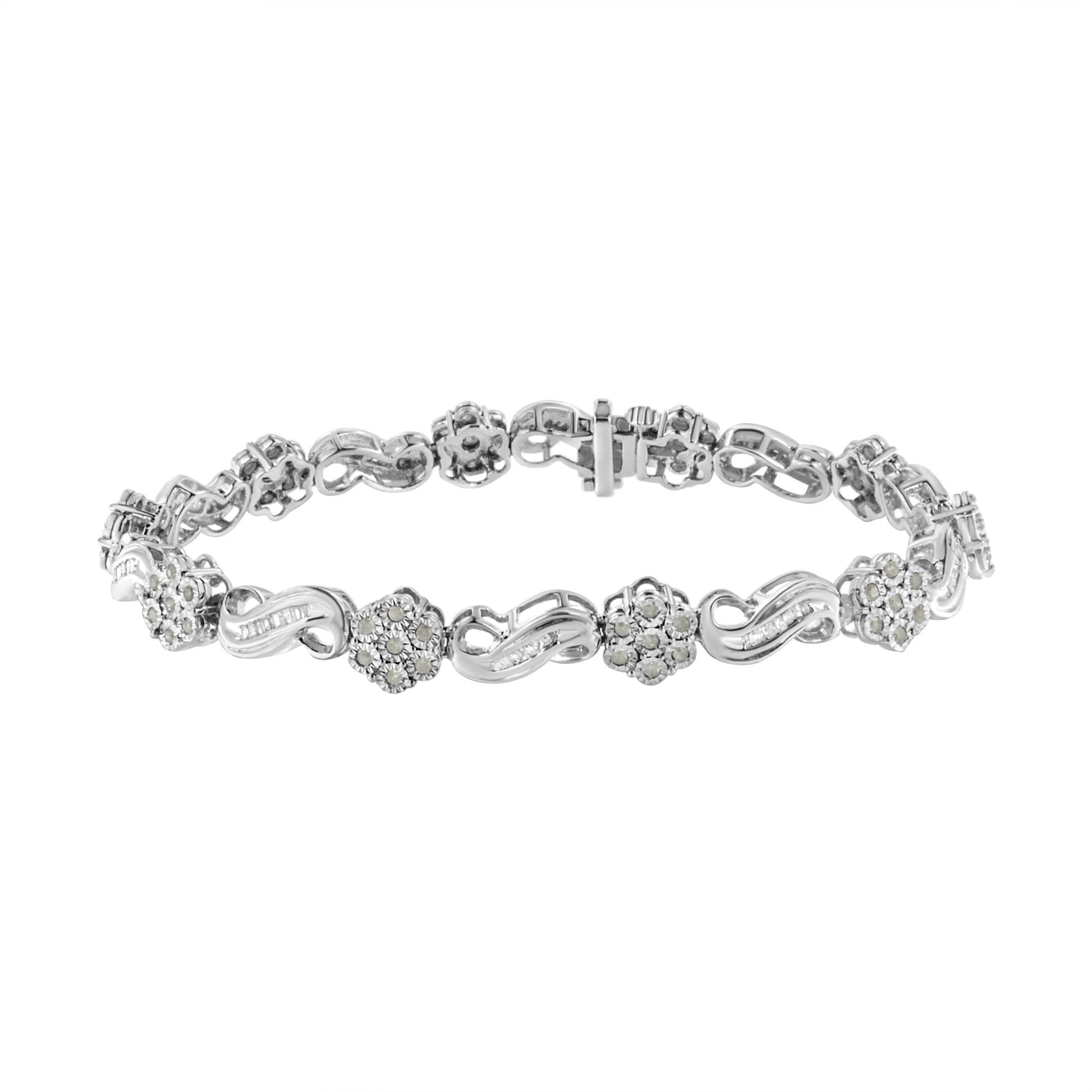 White metal bracelet with alternating flower and infinity-shaped links adorned with round and baguette white gemstones, shown from a front angle.