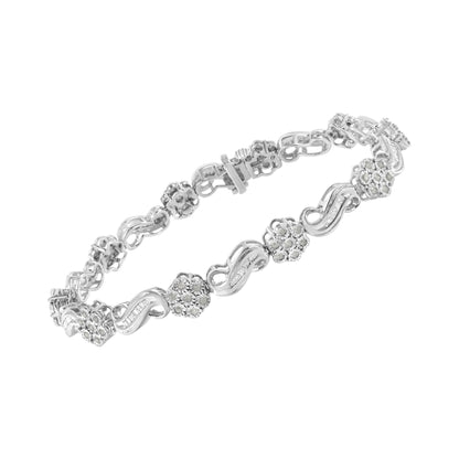 White metal bracelet with alternating round and baguette white gemstones, shown from a slightly angled top view against a white background.