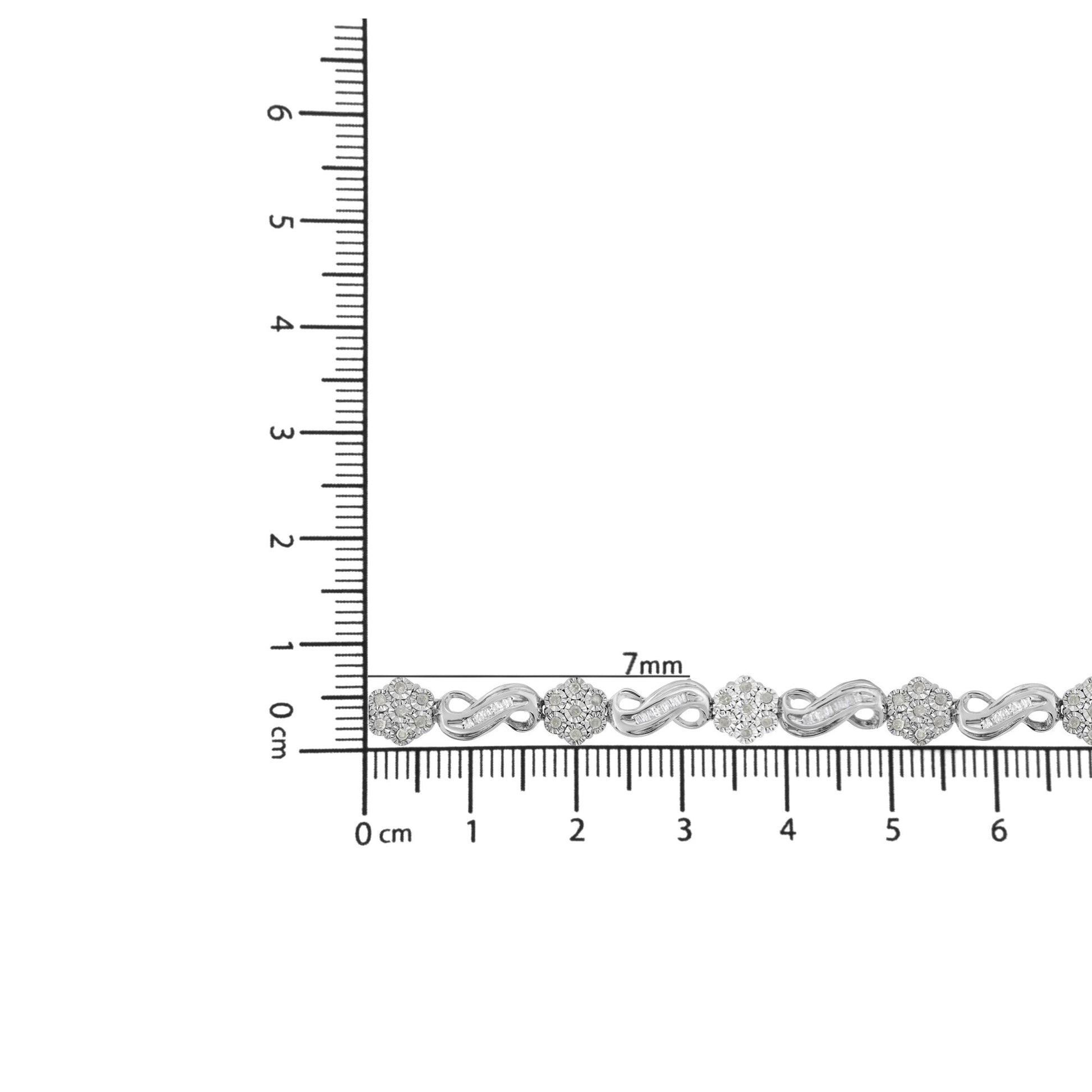 Bracelet with white metal, round and baguette-shaped white gemstones, shown on a ruler for size reference from a top-down angle.