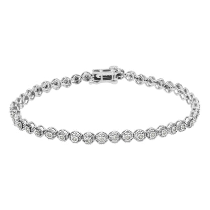 White metal bracelet with round white gemstones in a miracle setting, shown from a front angle.