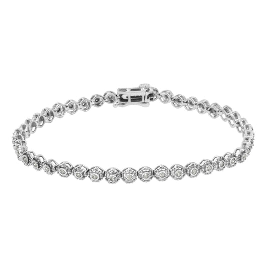 White metal bracelet with round white gemstones in a miracle setting, shown from a front angle.