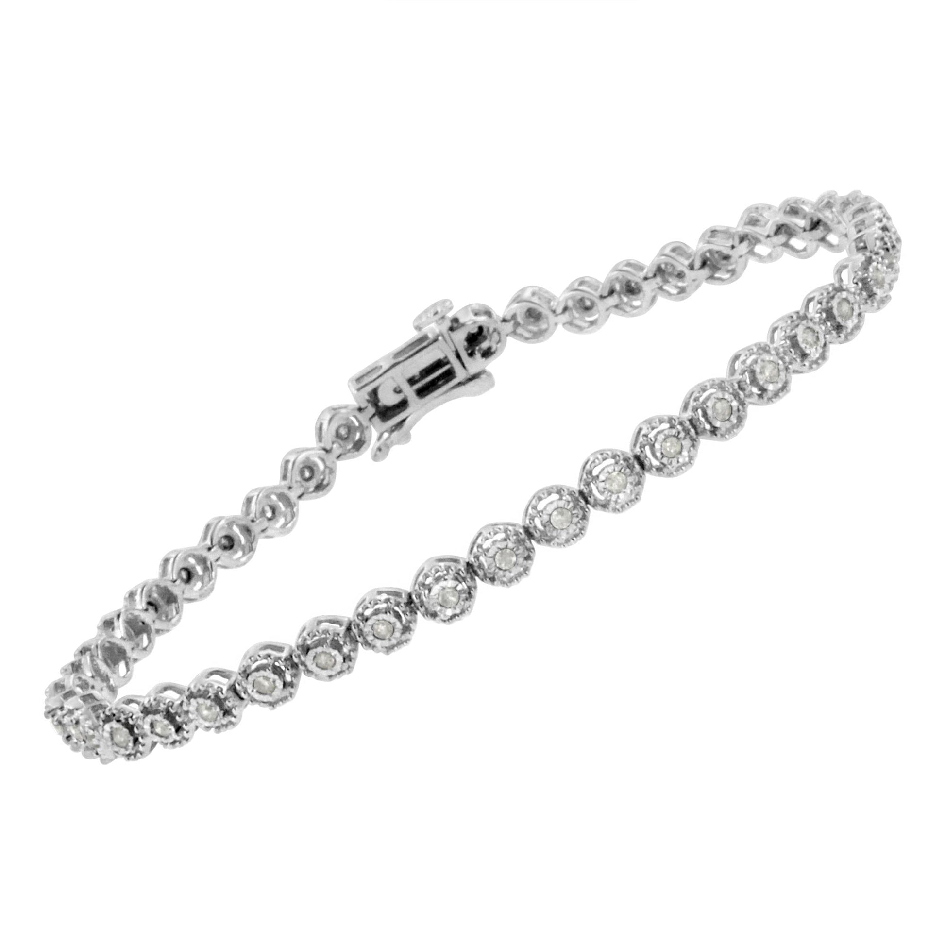 White metal bracelet with round white gemstones in a miracle setting, shown from an angled top view.